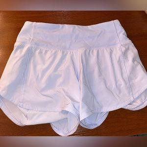 Lululemon running shorts with zipper pocket and built in underwear in size 0